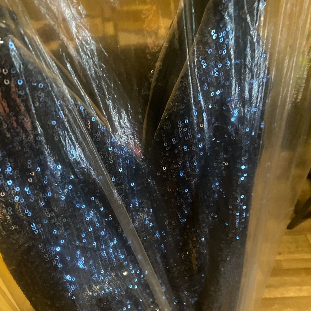 A beautiful sparkly sequin gown. Only worn once!
